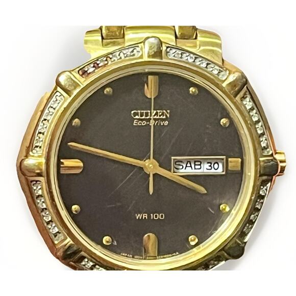 Citizen Eco-Drive Diamond Bezel Gold Tone Day Date Spanish WR100 Watch Works main image 7